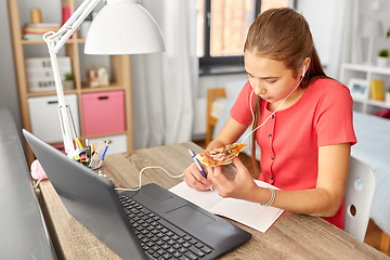 Image showing student girl in earphones with pizza at home