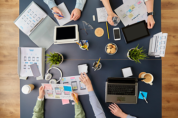 Image showing business team with gadgets working at office table