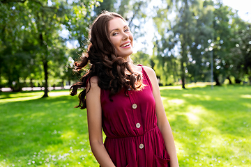 Image showing portrait of happy smiling woman at summer park