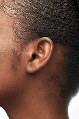 Image showing close up of african american woman's ear