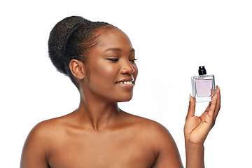 Image showing young african american woman with perfume