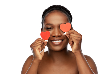 Image showing smiling african american woman with red hearts