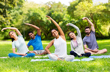 Image showing group of people exercising at summer park