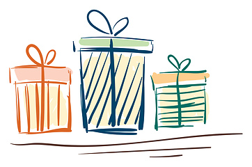 Image showing Set of three beautiful present boxes of various sizes wrapped in