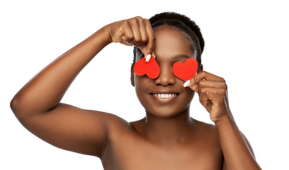 Image showing smiling african american woman with red hearts