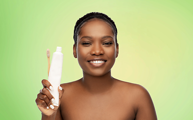 Image showing african woman with toothbrush and toothpaste