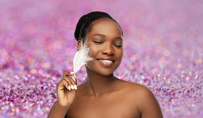 Image showing happy african american woman with feather