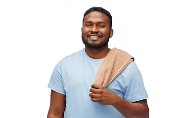Image showing smiling african american young man with bath towel