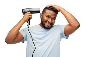 Image showing african american man with fan or hair dryer