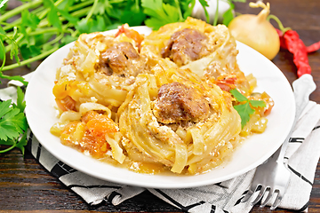 Image showing Pasta with meatballs in plate on dark board