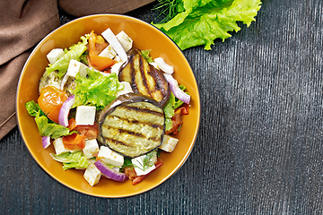 Image showing Salad of eggplant with feta and tomatoes on board top