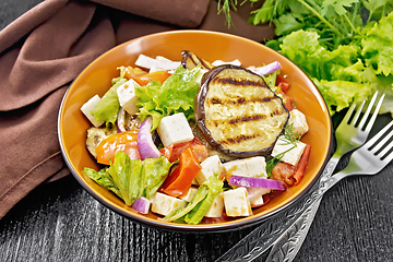 Image showing Salad of eggplant with feta and tomatoes on board