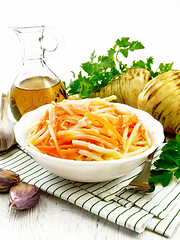 Image showing Salad of parsnip and carrot on table