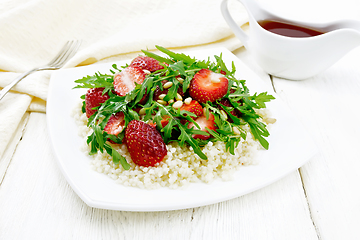 Image showing Salad of strawberry and couscous on white board