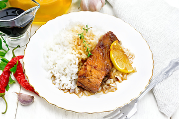 Image showing Salmon with sauce in plate on white board