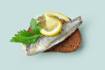 Image showing canned sardine on bread slice