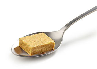 Image showing instant chicken broth cube in a spoon