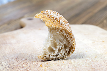 Image showing piece of fresh baguette