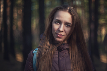 Image showing Pretty happy woman in forest