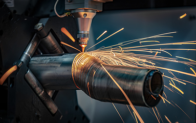 Image showing CNC Laser cutting of metal, modern industrial technology.