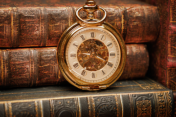 Image showing Old Books and Vintage pocket watch