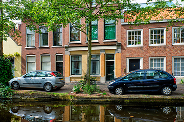 Image showing Cars on canal embankment in street of Delft. Delft, Netherlands