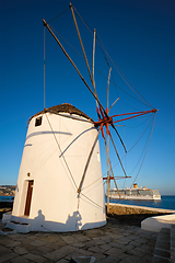 Image showing Traditional greek windmills on Mykonos island at sunrise, Cyclades, Greece