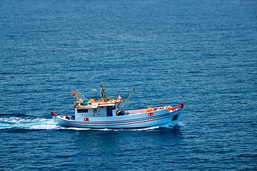 Image showing Greek fishing boat in Aegean sea near Milos island, Greece