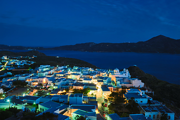 Image showing Greek town Plaka aerial view in the evening. Milos island, Greece