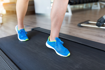 Image showing Woman running on treadmill