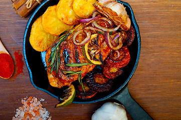 Image showing roasted grilled BBQ chicken breast with herbs and spices