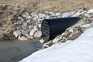 Image showing plastic corrugated drainage pipe with grate