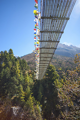 Image showing Suspension bridge over the river in Himalayas