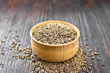 Image showing Cumin seeds in bowl on board