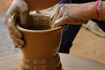 Image showing Indian potter hands at work, Shilpagram, Udaipur, Rajasthan, India