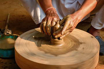 Image showing Indian potter hands at work, Shilpagram, Udaipur, Rajasthan, India