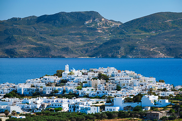 Image showing View of Plaka village with traditional Greek church. Milos island, Greece