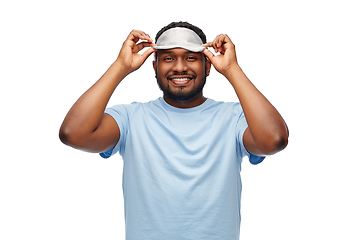 Image showing happy african american man with eye sleeping mask