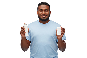 Image showing african american man with antiperspirant deodorant