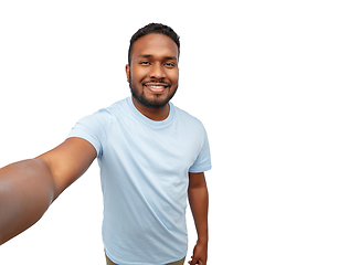 Image showing smiling young african american man taking selfie