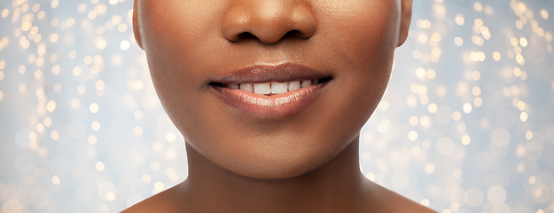 Image showing close up of face of smiling african american woman