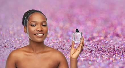 Image showing young african american woman with perfume