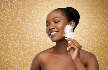 Image showing happy african american woman with feather