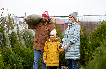 Image showing happy family buying christmas tree at market