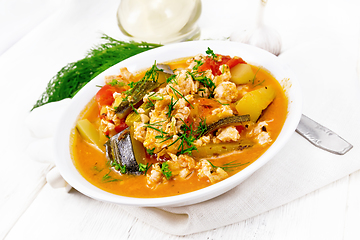 Image showing Ragout of zucchini and minced meat in plate on board