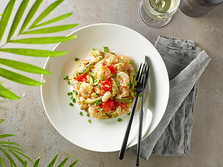 Image showing plate of risotto with zucchini and prawns