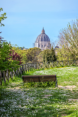 Image showing flowering meadow and a wooden bench