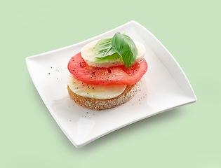 Image showing bruschetta with tomato and mozzarella