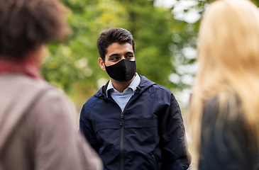 Image showing indian man in reusable mask at park