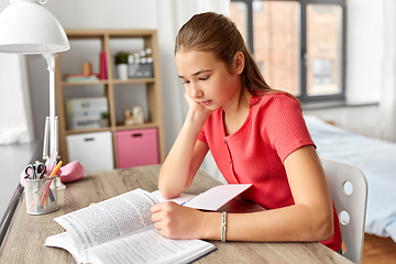 Image showing student teenage girl reading book at home